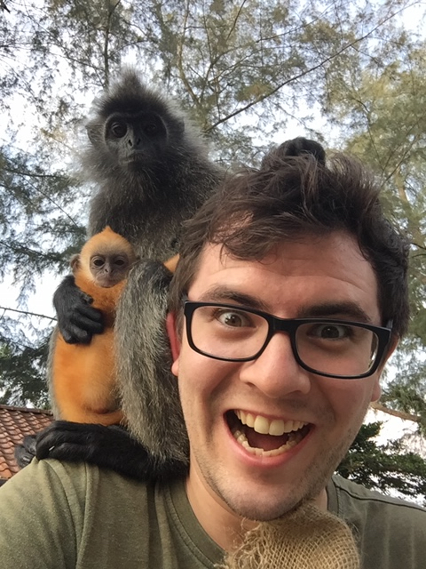 Photo of a monkey sitting on my shoulder in Kuala Selangor